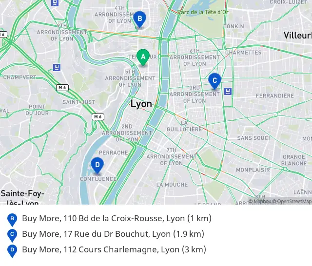 Map of central Lyon with the three nearest Buy More stores lettered B to D and their addresses and distances in kilometres listed below