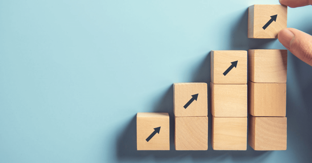 wooden blocks representing growth