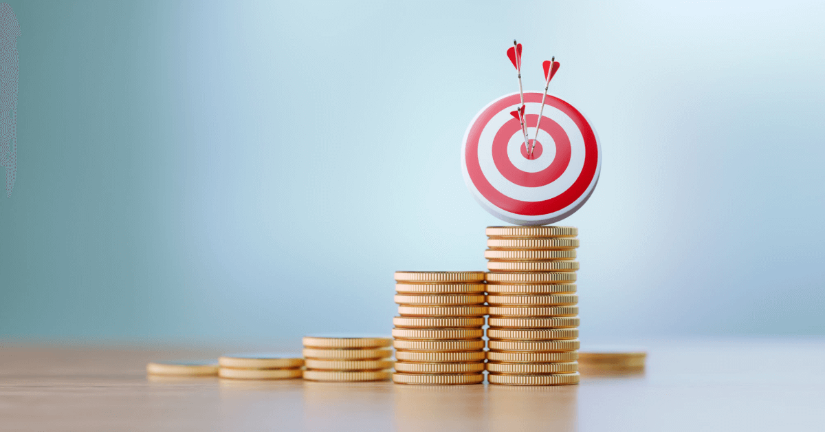 a target sitting on a pile of coins